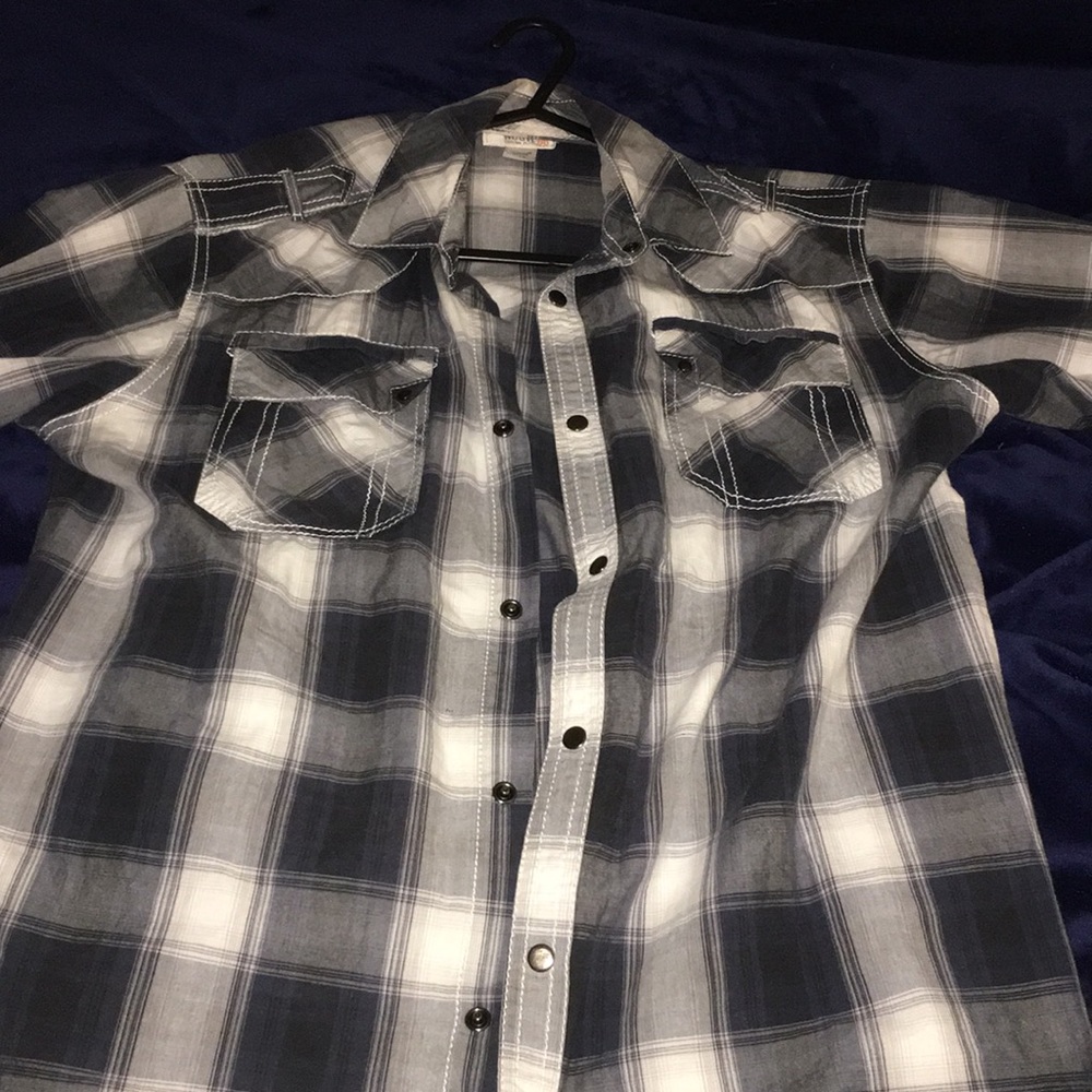 Checkered button-down shirt.